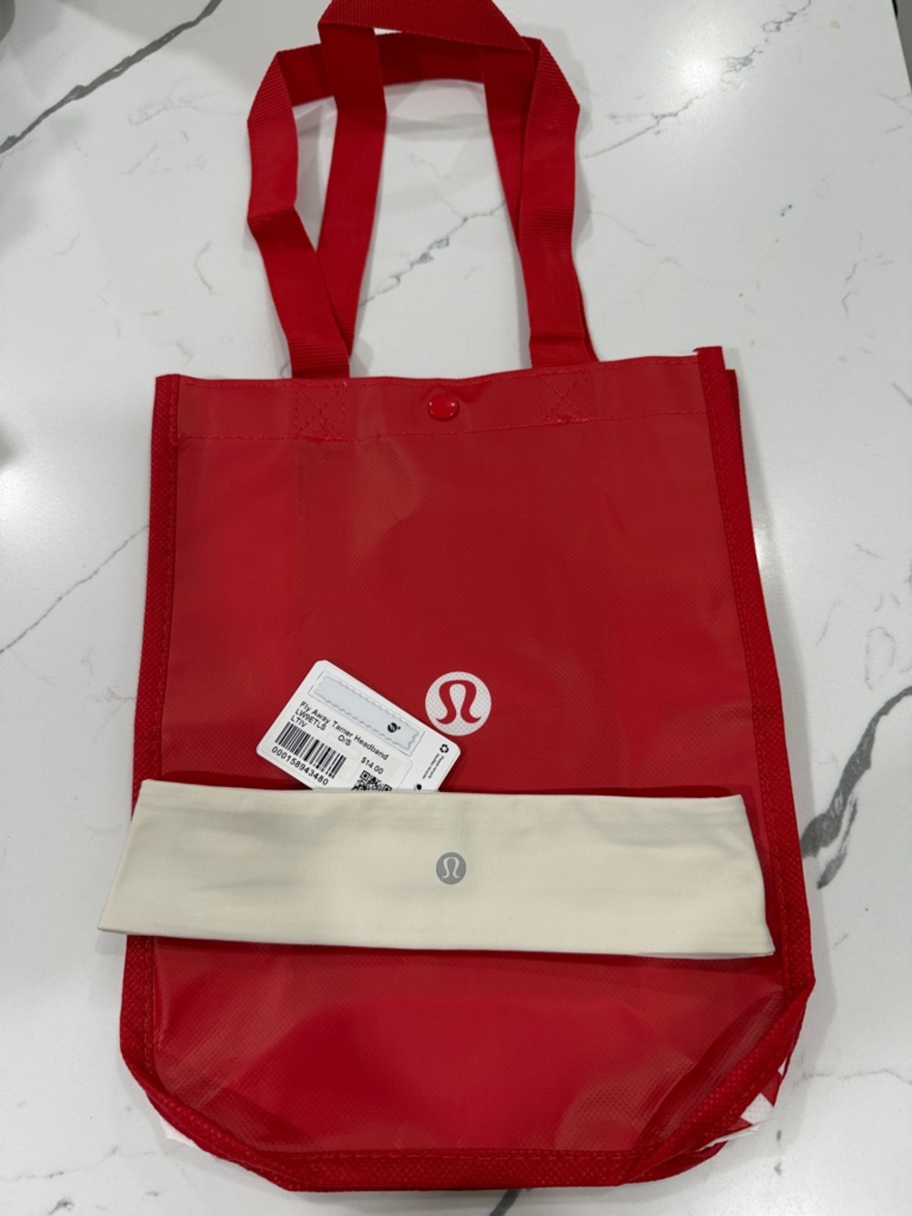 lululemon athletica cream fly away tamer headband and red small lululemon bag